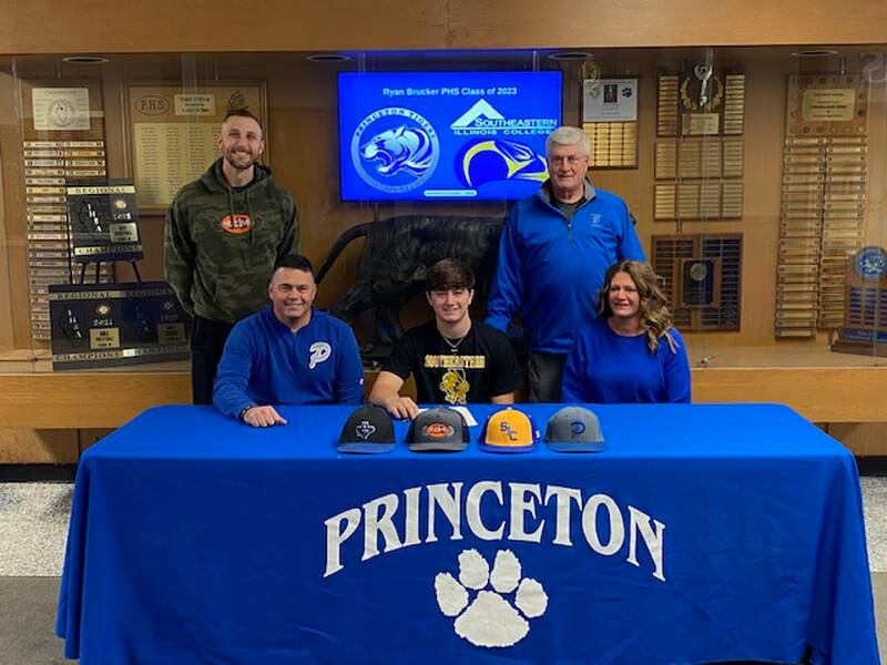 Princeton High School senior Ryan Brucker signs to play baseball with Southeast Illinois College in Harrisburg. He is pictured with his parents, Tony and Kimberly; and (back row) JJ Raffleson (trainer) and PHS baseball coach Wick Warren.