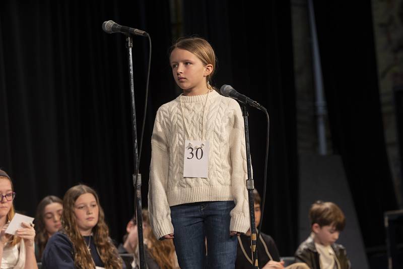 St. Paul Lutheran fifth-grader Ashley Carmichael competes Thursday, Feb. 22, 2024, at the Lee-Ogle-Whiteside regional spelling bee. Carmichael missed on the word “stupefy” in round three.