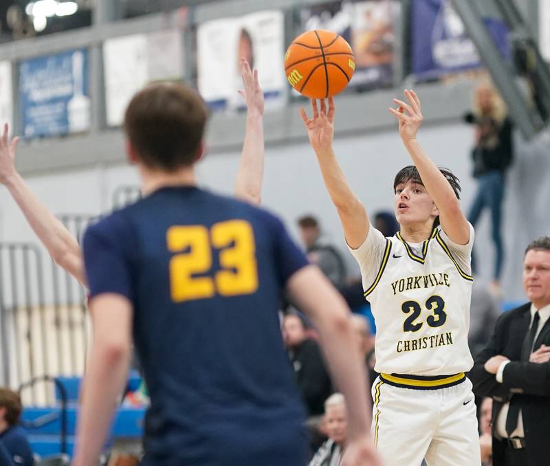 Yorkville Christian's Zach Marini (23) shoots a three pointer against Neuqua Valley during a basketball game at Yorkville Christian High School on Tuesday, February 4, 2025.
