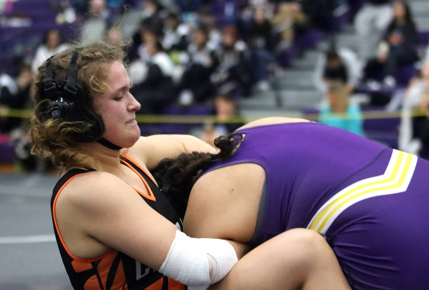 Crystal Lake Central’s Cait Jones battles Gesselle Vazquez of Wauconda at 155 pounds in IHSA Regional wrestling semifinal action on Saturday, Feb. 1, 2025, at  Hampshire High School  in Hampshire.