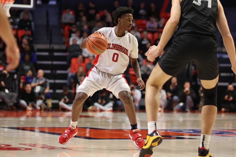 Bolingbrook’s Mekhi Cooper look to make a play against Glenbard West in the Class 4A semifinal at State Farm Center in Champaign. Friday, Mar. 11, 2022, in Champaign.
