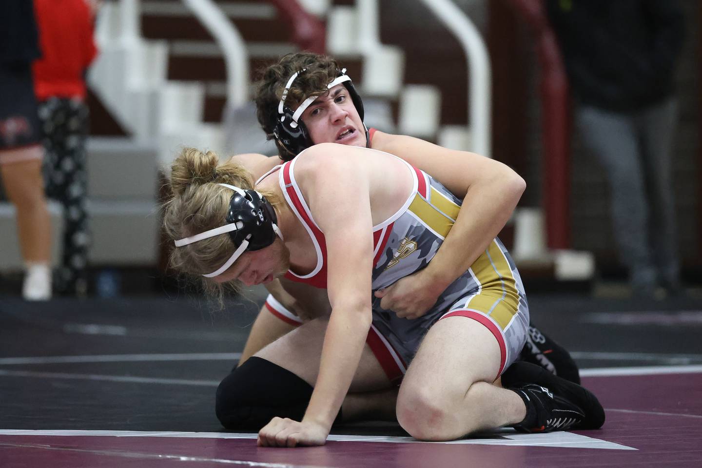 Ottawa’s D Sibert wraps up Morris’ Jeffery Martinez in the 165 pound match on Wednesday, Dec. 10, 2025 in Morris.