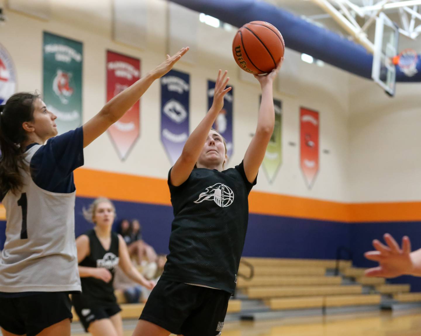 Kaneland's Lexi Schueler (3) attempts a contested layup at the Oswego High School Shootout. June 30, 2022.