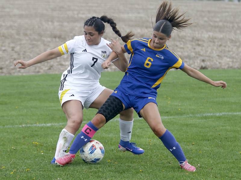 Harvard's Ithandehui Rosas battles with Johnsburg's Liz Smith for control of the ball during a Kishwaukee River Conference soccer match on Wednesday, April 27, 2026, at Johnsburg High School.