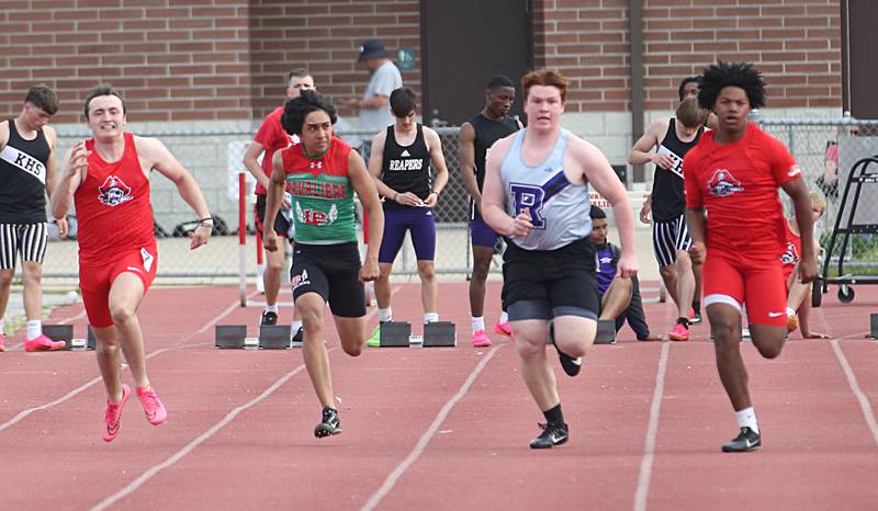(From left) Ottawa's Levi Sheehan, L-P's Jaiden Torres, Rochell's Landon Delille, and Ottawa's Colby Mortenson compete in the 100 meter dash during the I-8 Boys Conference Championship track meet on Thursday, May 11, 2023 at the L-P Athletic Complex in La Salle.