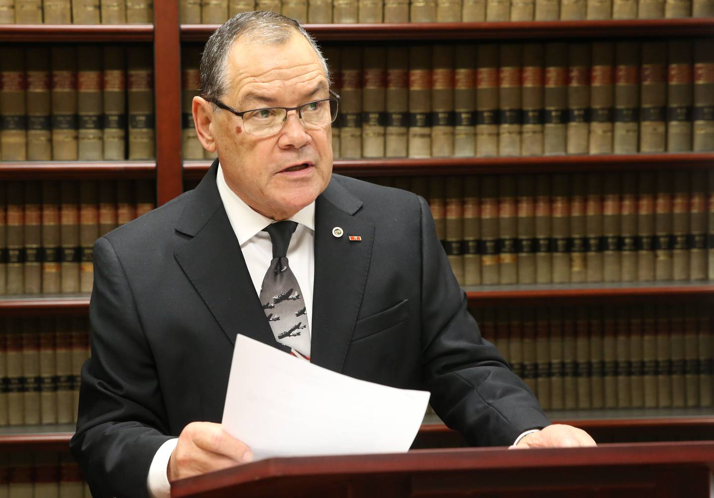 La Salle County State's Attorney Joe Navarro address the media during a news conference on Tuesday, Jan. 7, 2025, at the La Salle County Government Complex in Ottawa. Prosecutors have charged six individuals with felonies for obtaining COVID-19 relief funds under false pretenses.