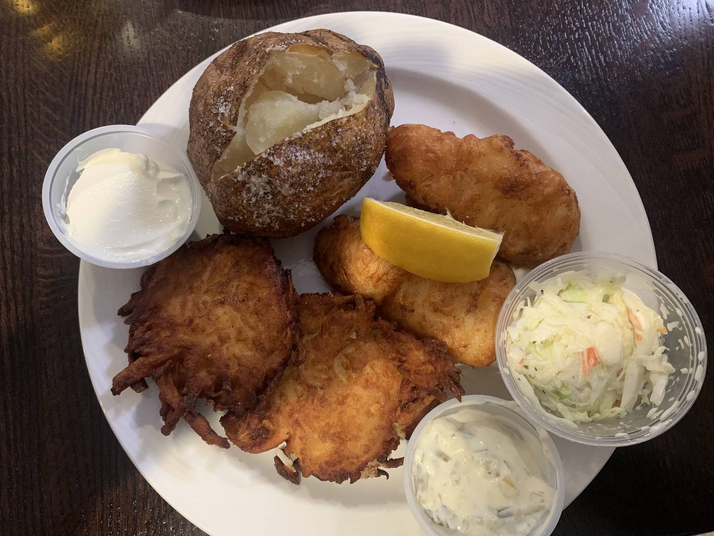 There are two options for the fish fry on the menu at VFW Post 4600, beer battered or baked hand-cut cod with coleslaw and a choice of potato (baked, potato pancakes, fries or tater tots). A two-piece meal costs $12; $15 for four pieces.