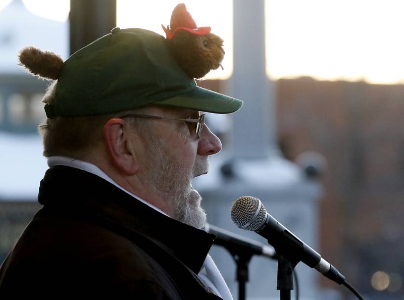 Woodstock Groundhog Days Committee Chairman Rick Bellairs speaks to the crowd Thursday, Feb, 2, 2023, during the annual Groundhog Day Prognostication on the Woodstock Square.