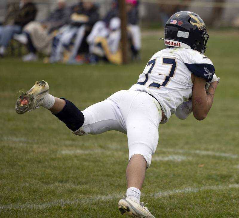 Hiawatha’s Issac Ramangkoun hauls in an interception against Polo Saturday, Nov. 1, 2025, in the 8-man football playoff quarterfinals.