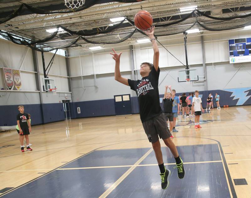 Parker Mallone of Prophetstown, runs in the lane for layup during the Fellowship of Christian Athletes Basketball Camp on Tuesday, July 8, 2025 at Bureau Valley High School.