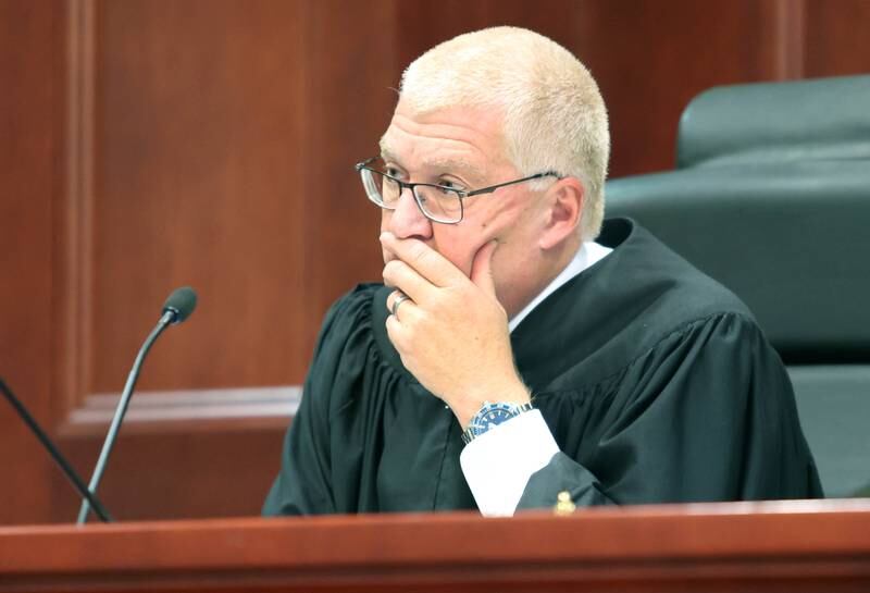 DeKalb County Judge Philip Montgomery listens to opening statements Wednesday, Oct. 5, 2022, during the trial of former DeKalb School District 428 Superintendent Douglas Moeller. Moeller was charged in April 2018 with non-consensual dissemination of private sexual images, a class 4 felony.