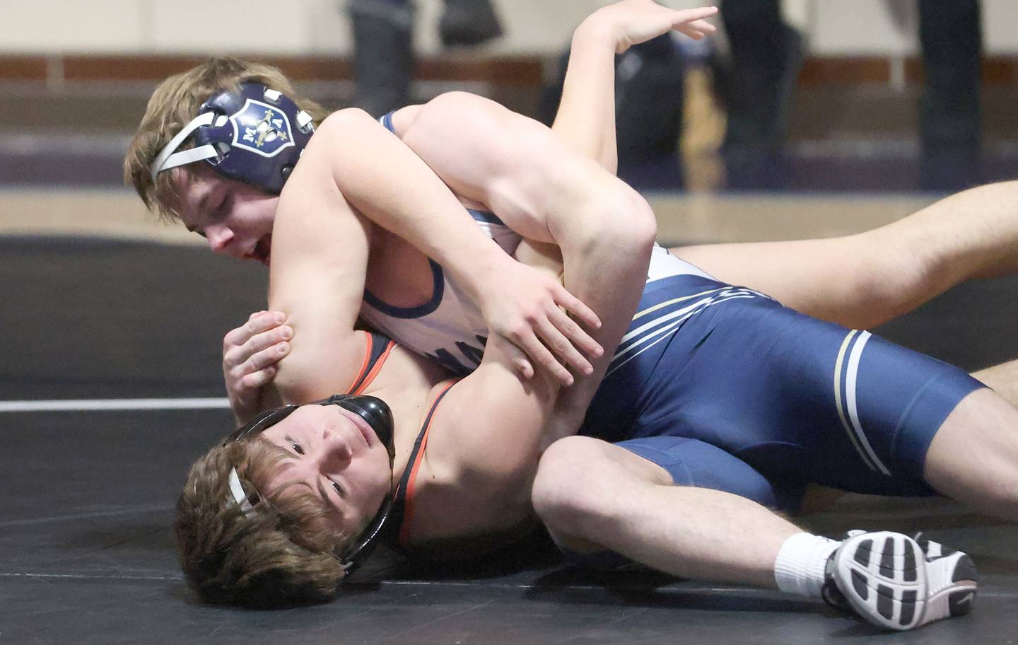 Marquette's Koby Clark Wrestles Bradley-Bourbonnias's Aiden Baud on Wednesday, Jan. 14, 2026 in Bader Gymnasium at Marquette Academy.