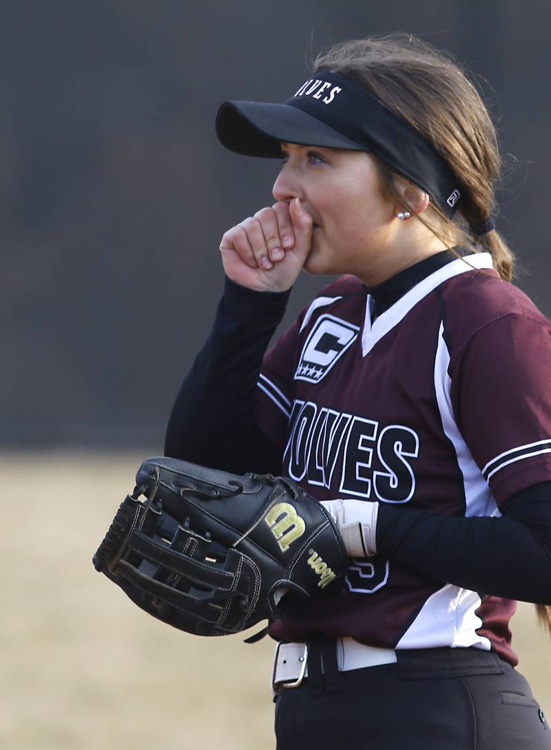 Prairie Ridge’s Mary Myers warms her hand  during a nonconference softball against Grayslake North Thursday. March 23, 2023, at Grayslake North High School.