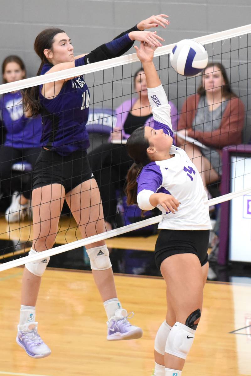 Wilmington's Rachel Smith, left, tips the ball past Manteno's Danika Fletcher during a game at Manteno Tuesday, Oct. 7, 2025.