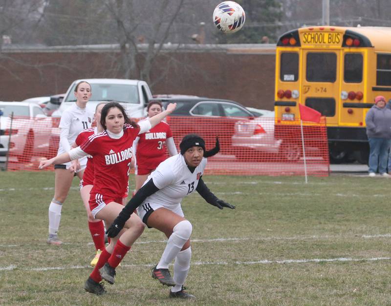 Streator's Ady Lopez and L-P's Kay Grebner run after the ball on Friday, March 24, 2023 in Streator.