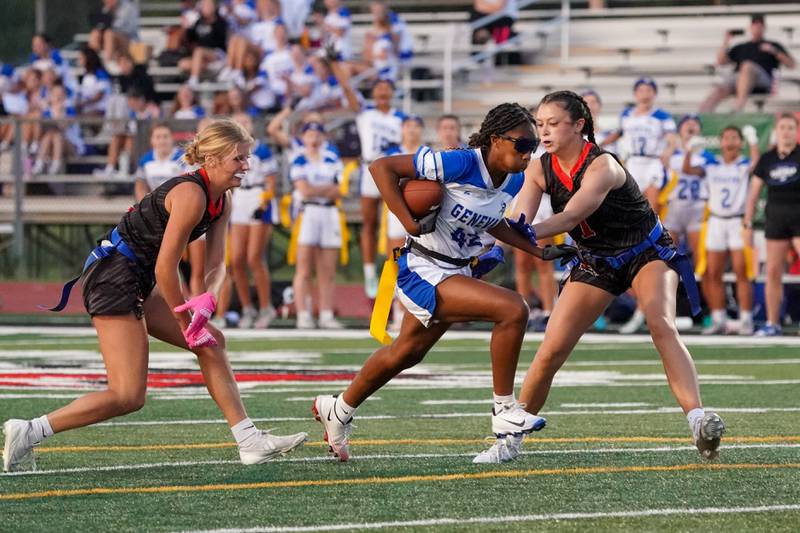 Geneva’s Alyssa Flotte (42) runs after the catch for a touchdown against Yorkville during a non-conference game at Yorkville High School on Tuesday, Sept. 2, 2025.