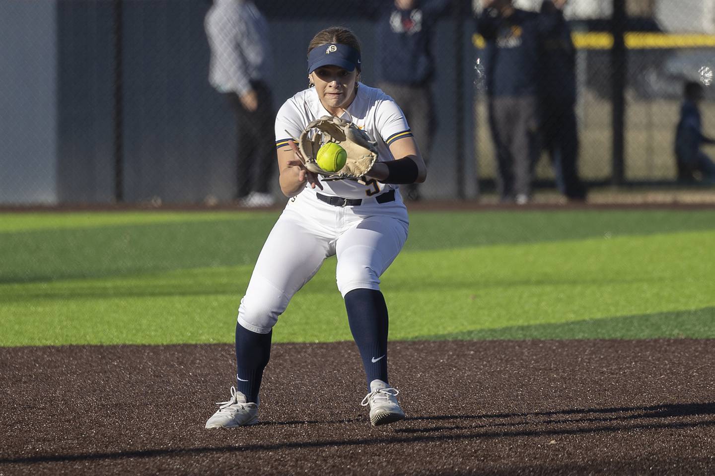Sterling’s Mya Lira snags a hopper at shortstop for an out against Dixon Tuesday, March 25, 2025.