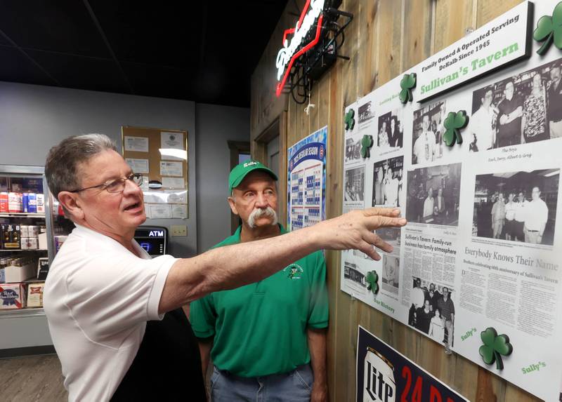 Earl (left) and Greg Sullivan, who own Sullivan's Tavern with brother Albert and sister-in-law Cindy, (not pictured) talk about some of the history of the location Thursday, May 15, 2025, at the tavern in DeKalb. The bar is celebrating 80 years in business with an event Saturday, May 17, that will include food and live entertainment.