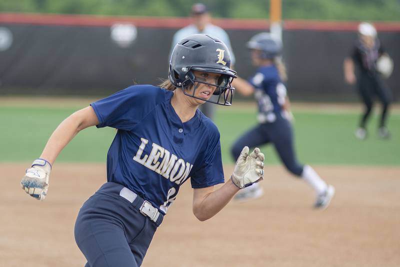 Lemont’s Allison Pawlowicz hits third base against Antioch Friday, June 10, 2022 in the class 3A IHSA state softball semifinal game. Pawlowicz later scored.