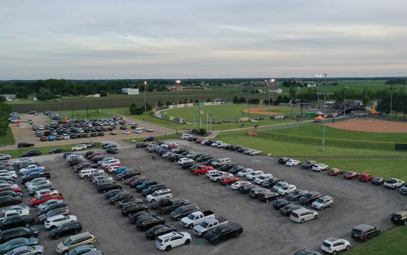 Vehicles fill the parking lot during the home opener of the Pistol Shrimp on Thursday, May 30, 2024 at Veterans Park in Peru.