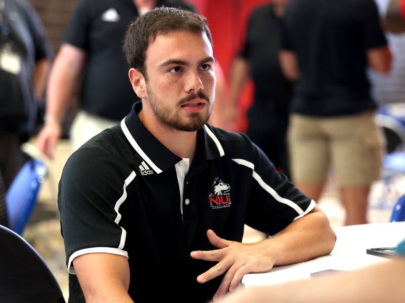 Northern Illinois kicker Andrew Glass talks to a reporter Wednesday, Aug. 13, 2025, during the NIU fall sports media day in the Yordon Center at NIU in DeKalb.