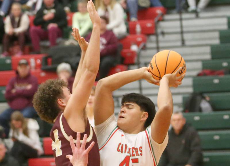 L-P's Andy Medina looks to get around Morris's Colin Pfeifer on Friday, Dec. 6, 2024 in Sellett Gymnasium at L-P High School.
