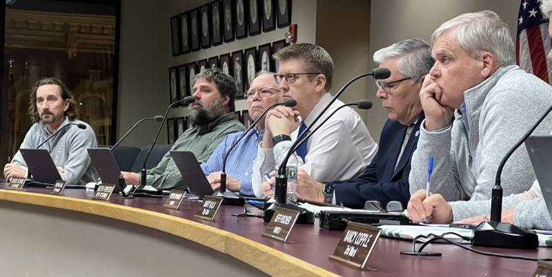 Sycamore's First Ward Alderman, Josh Huseman; Second Ward Alderman Pete Paulsen; Second Ward Alderman, Chuck Stowe; Sycamore City Manager Michael Hall, Sycamore Attorney Keith Foster, and Sycamore's Mayor Steve Braser look on during the public comment period of the Sycamore City Council meeting on Dec. 19, 2022.