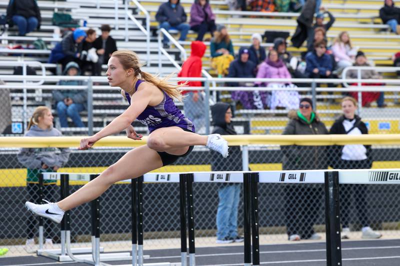 Wilmington's McKenna Van Tilburg clears a hurdle during the 100-meter hurdles at the Herscher Track Invite on Friday, May 1, 2026.
