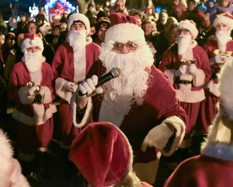 Santa speaks to community members that came out to the tree lighting ceremony on Friday Nov. 21, 2025, held at Riverfront Park in Yorkville.