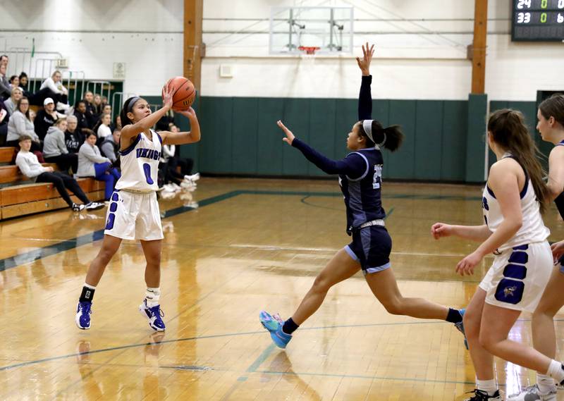 Geneva’s Rilee Hasegawa shoots the ball during a Class 4A Glenbard West Sectional semifinal game against Lake Park in Glen Ellyn on Tuesday, Feb. 21, 2023.