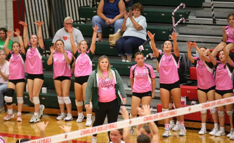 St. Bede volleyball players react after getting a point against L-P during the "Cavs 4 A Cause" pink night game on Tuesday, Sept. 26, 2023 at Sellett Gymnasium.