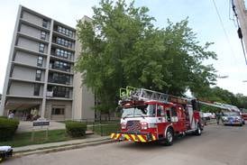 Photos: Fire departments respond to fire at Peru high-rise