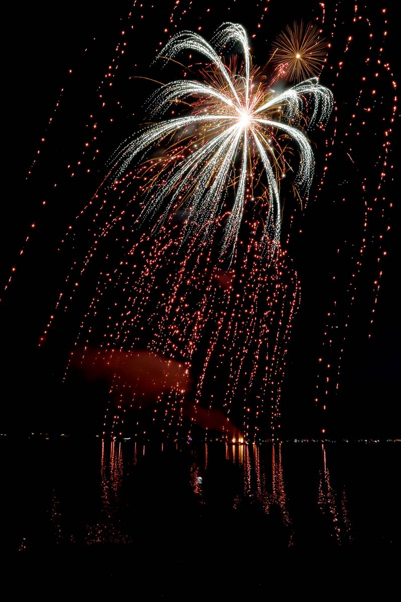 Fireworks dazzle the sky above Crystal Lake on Sunday, July 2, 2023, at Crystal Lake’s Main Beach during Crystal Lake Annual Independence Day Celebration.