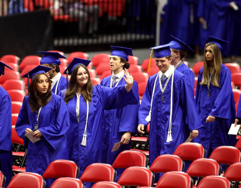 St. Charles North graduates enter the facility during the school’s commencement ceremony at Northern Illinois University in DeKalb on Monday, May 20, 2024.
