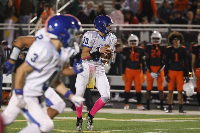 Joliet Central’s Paul Slick looks to pass against Plainfield East on Oct. 4, 20234 in Plainfield.