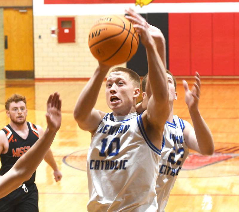 Sterling Newman's George Jungerman (10) rebounds against Milledgeville on Saturday, Dec. 13, 2025 at the 64th Annual Forreston Holiday Basketball Tournament at Forreston High School.