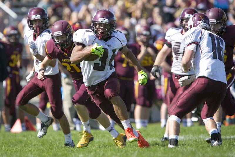 Marengo's Jarrell Jackson (34) runs the ball for a touchdown during the game at Richmond-Burton High School on Saturday, Sept. 19, 2015. Marengo won 28-14.
