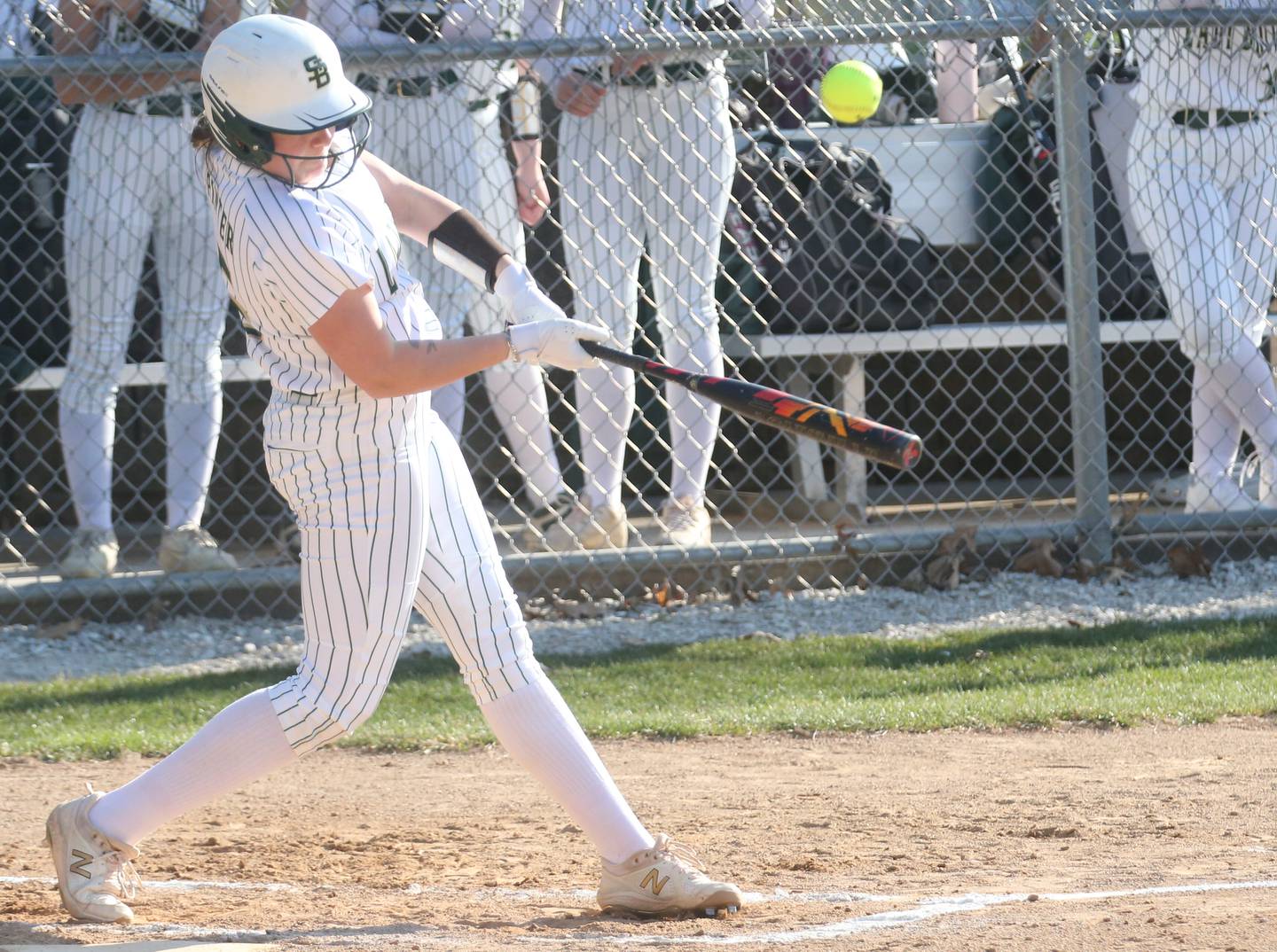 St. Bede's Bella Pinter smacks a hit against Midland on Thursday, March 21, 2024 at St. Bede Academy.