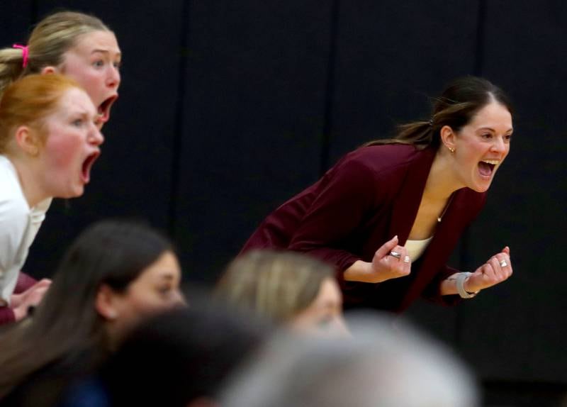 Prairie Ridge’s Head Coach Leah Groat and coaches and players get revved up as the Wolves polish off a win against St. Viator in IHSA Class 3A Super-Sectional girls volleyball at Streamwood High School in Streamwood on Monday, November 10, 2025.