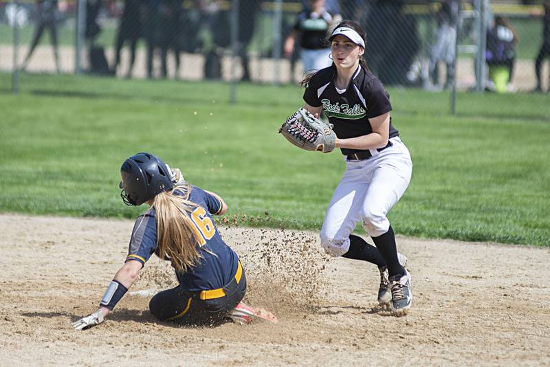 Rock Falls’ Brooke Howard looks to throw to first after getting the lead runner out against Sterling Saturday, May 14, 2022.