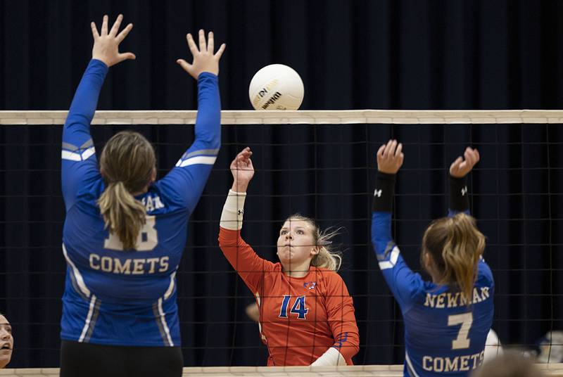 Eastland’s Olivia Klinefelter plays the ball over the net in game one Wednesday, Oct. 26, 2022 in the semifinal volleyball match against Newman.