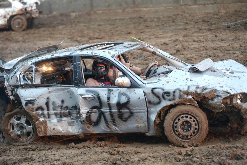 Jaden Muntean of Sterling rides in the passenger seat of the Open Wire heat at the Ogle County Fair on Saturday, Aug. 5, 2023. His cousin, Brenton Muntean, was the driver.