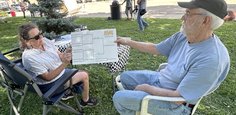 Amy Bold and Harold Harrison were the official "bracketeers" for the Straw Bale Race held at Strawfest on Saturday, Aug. 23, 2025 in downtown Mt. Morris.
