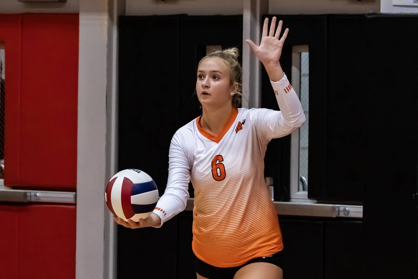 Minooka's Kendall Kozak serves during a varsity volleyball away game against Bolingbrook on Sept. 25, 2025.