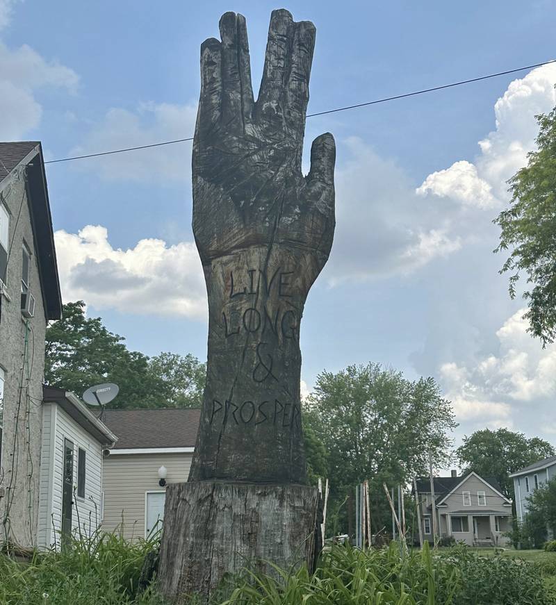 This tall Vulcan hand salute statue reads "live long & prosper" at the corner of Herbert and 1st Streets on Thursday, June 1, 2023 in Peru.