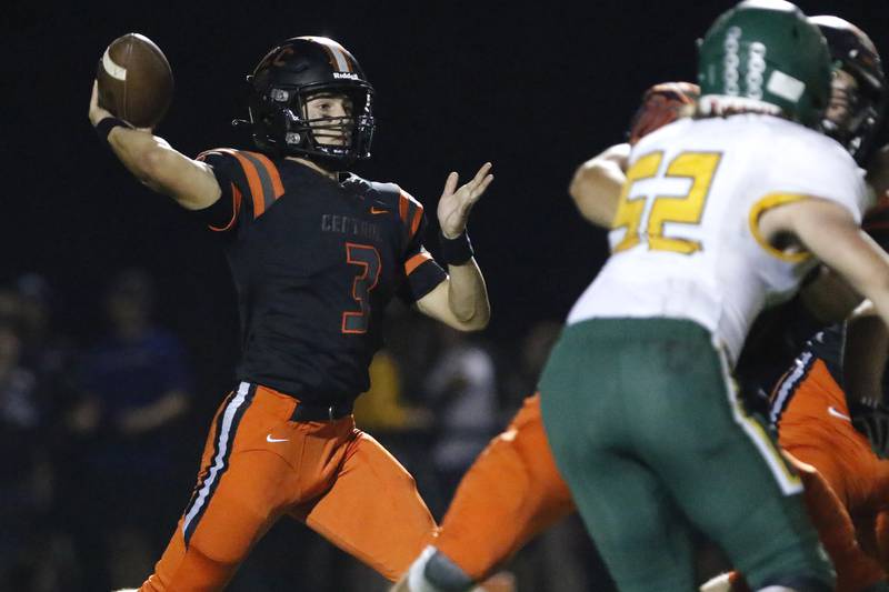 Crystal Lake Central quarterback Colton Madura looks for a pass against Crystal Lake South during their football game on Friday, Oct. 1, 2021 at Crystal Lake Central High School in Crystal Lake.