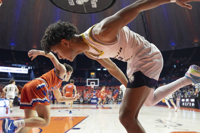 Peoria Christian’s Jacob Walton falls out of bounds against Eastland Thursday, March 13, 2025, during the Class 1A boys basketball state semifinal.