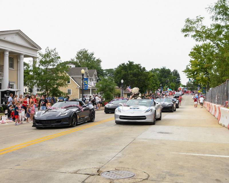 Corvettes drive down the parade route during the Independence Day parade on Friday July 4, 2025, during the Independence Day parade in downtown Downers Grove.