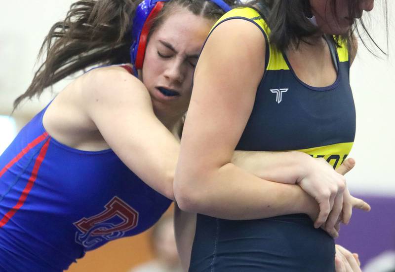 Dundee-Crown’s Violet Wheatley, left, battles Neuqua Valley’s Carla Aloran at 130 pounds in Whip-Pur Women’s Classic varsity girls wrestling on Saturday, Dec. 20, 2025, at Hampshire High School in Hampshire.