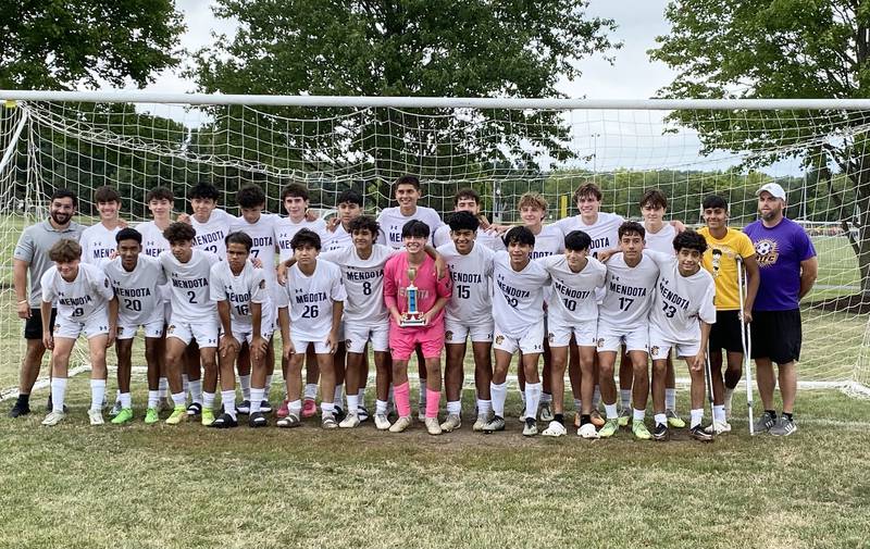 The Mendota boys soccer team poses with its trophy on Saturday, Aug. 26, 2023 after winning the Oregon tournament for the third year in a row.
